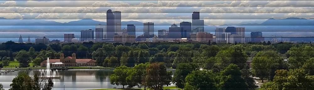Denver skyline with Rocky Mountains in the background